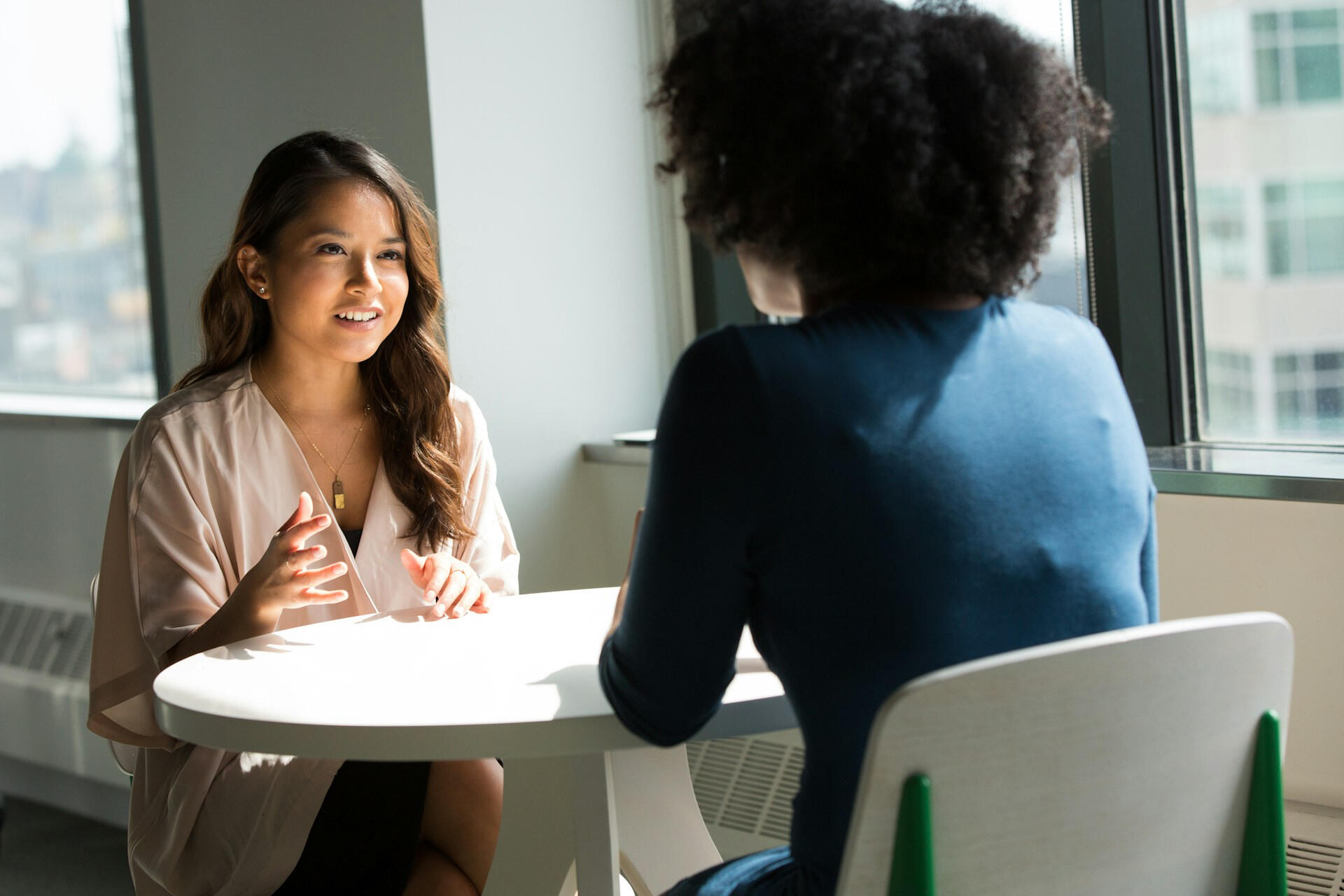 Two ladies in conversation